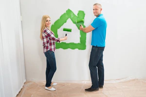 Couple Making House With Paint
