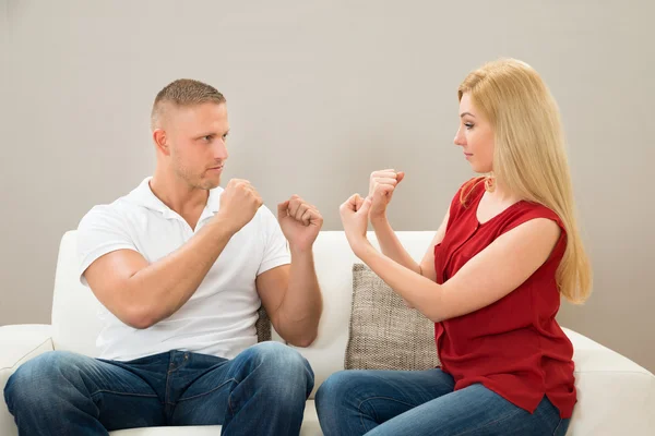 Couple On Sofa Fighting