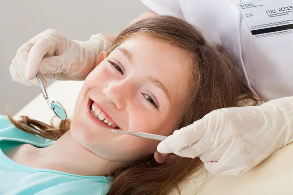 Happy Girl Undergoing Dental Treatment