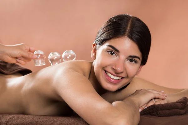 Woman Receiving Cupping Therapy