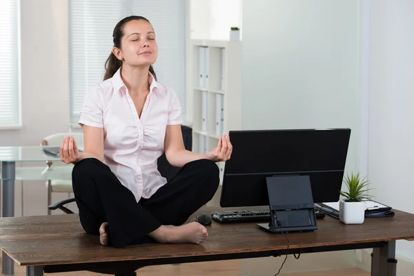 Businesswoman Doing Meditation