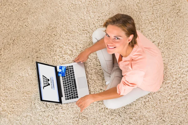 Woman Doing Online Shopping With Laptop
