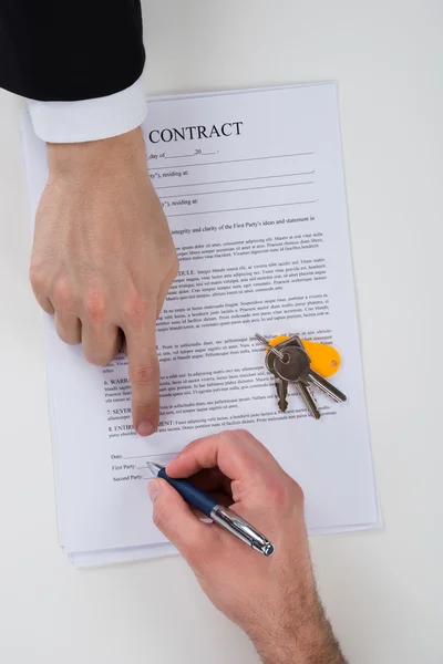 Assisting Client To Sign Contract Paper