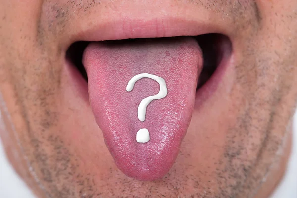Man With Question Mark On Tongue