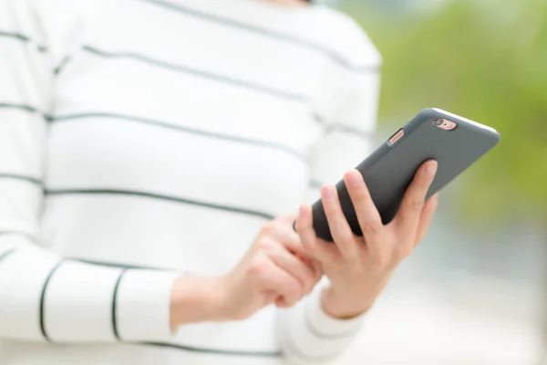 Woman using smart phone