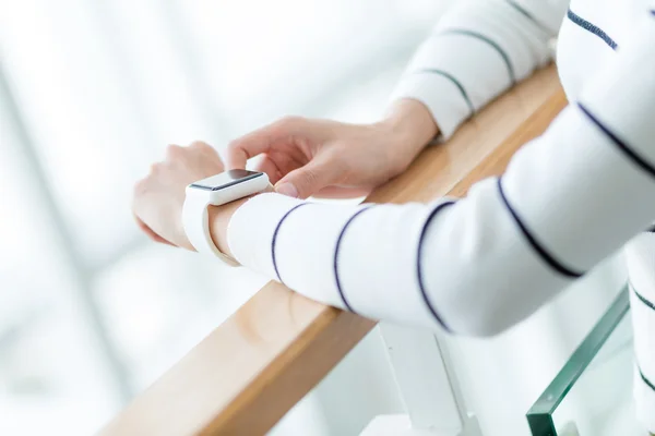 Woman using smart watch