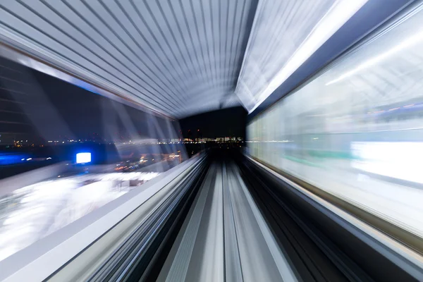 Motion blur of a city and tunnel