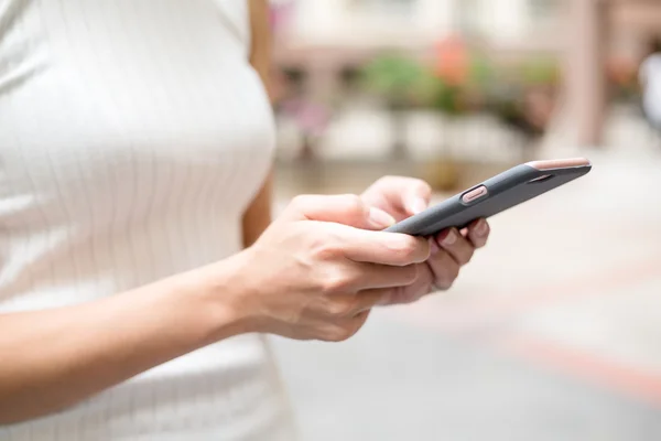 Woman using smart phone