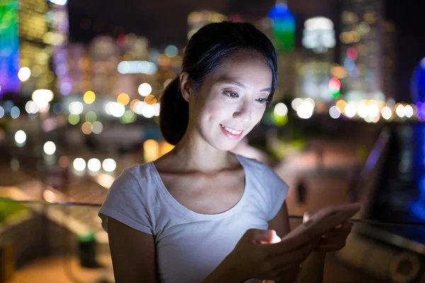 Woman looking at mobile phone