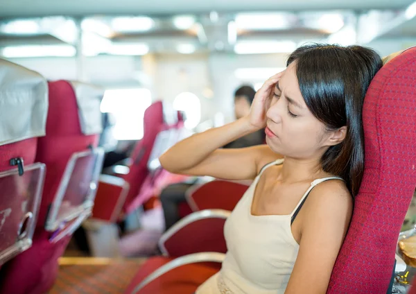 Woman suffering from seasick on the ferry