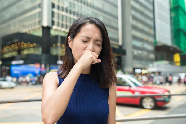 Woman feeling nose allergy