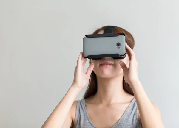 Woman using Virtual Reality Headset