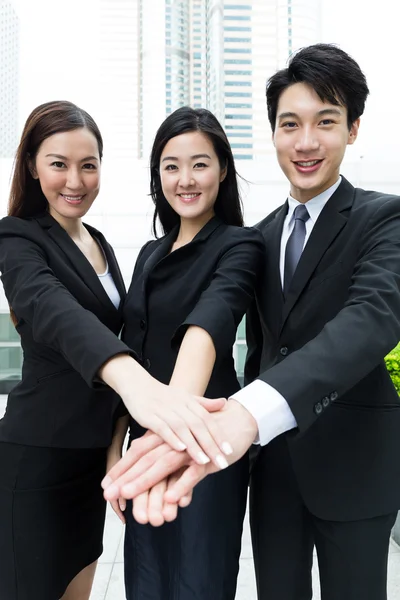 Asian business team work together