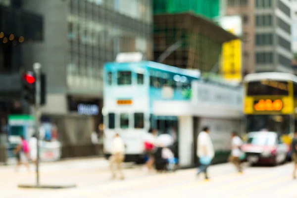 Crosswalk and pedestrians at street in Hong Kong