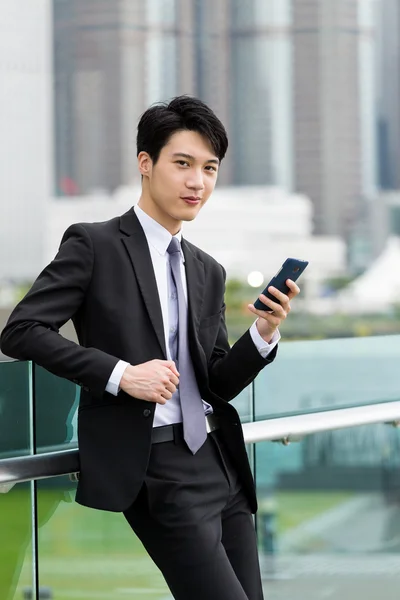 Asian businessman in business suit at outdoor