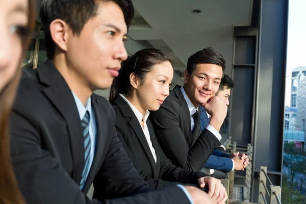 Asian business people standing at outdoor