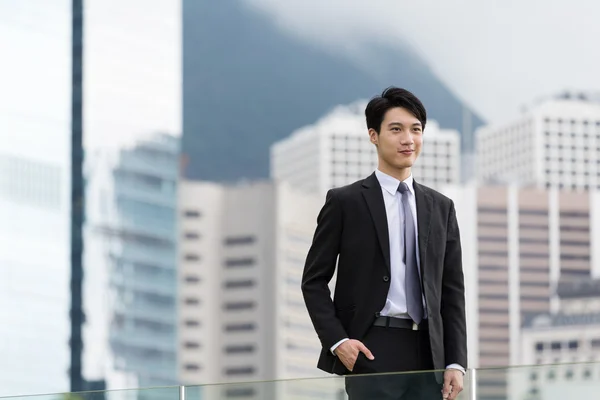 Asian businessman in business suit at outdoor