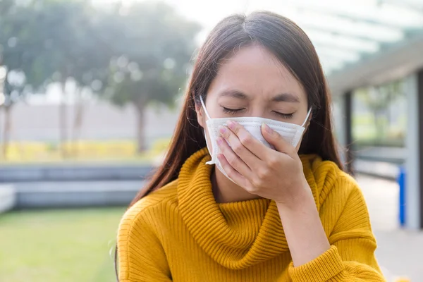 Asian woman wearing face mask