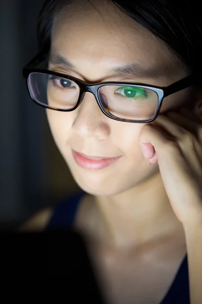 Asian young woman in eyeglasses