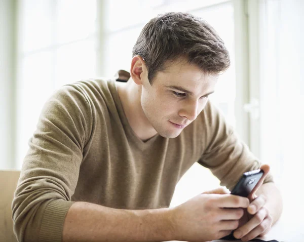 Businessman using cell phone