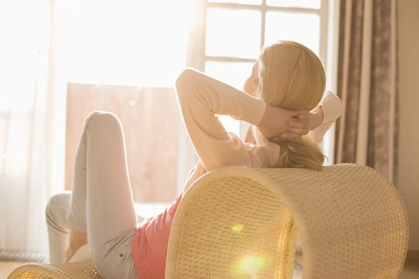 Woman relaxing on chair