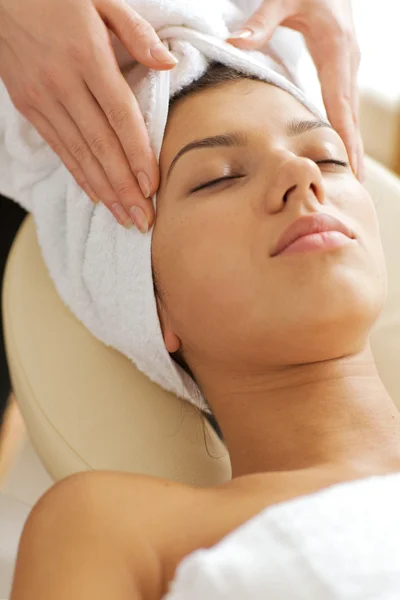 Woman receiving energy therapy
