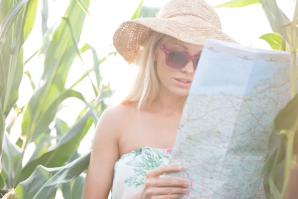 Woman reading map