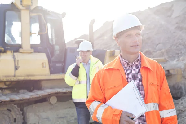 Engineer holding clipboard