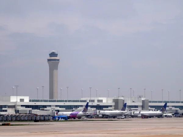 Planes parked at Denver International Airport