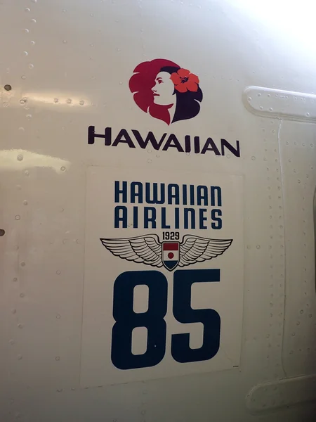 Hawaiian Airlines logo marking 85 years of service of side of pl