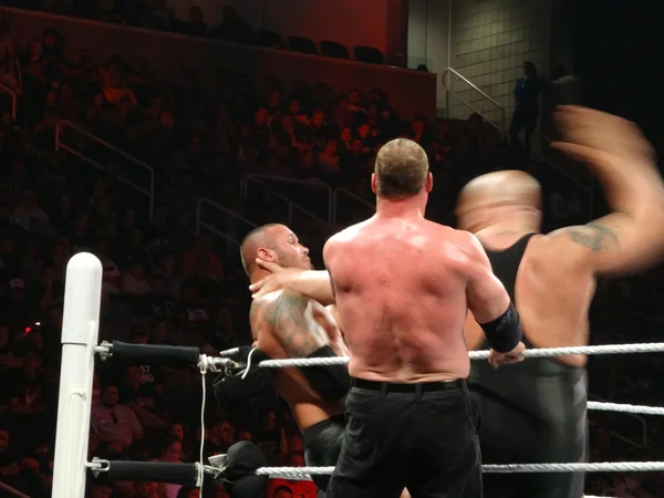 WWE Wrestler Big Show winds up to slap Superstar Randy Orton in