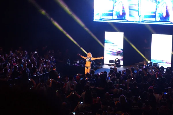 NXT Female wrestlers Charlotte Flair and does a woo as she enter