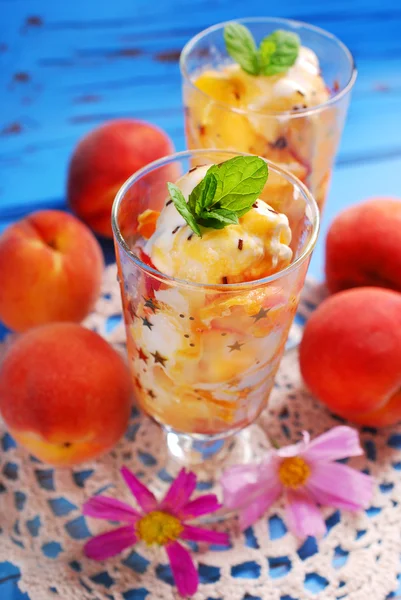 Peach and vanilla ice cream with caramel and mint
