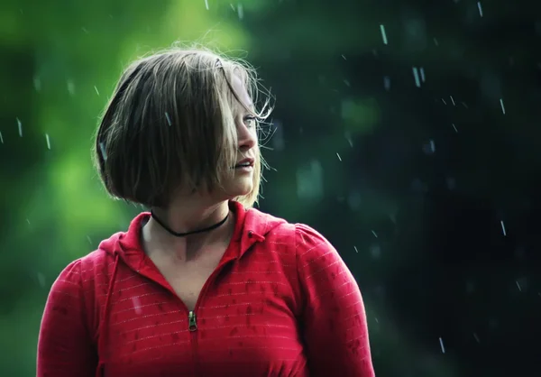 Girl caught in rain storm