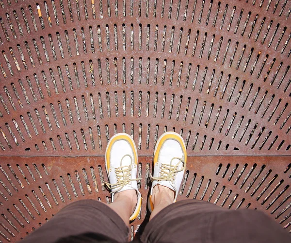 Yellow and white boat shoes