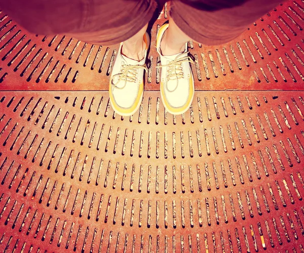 Yellow and white boat shoe