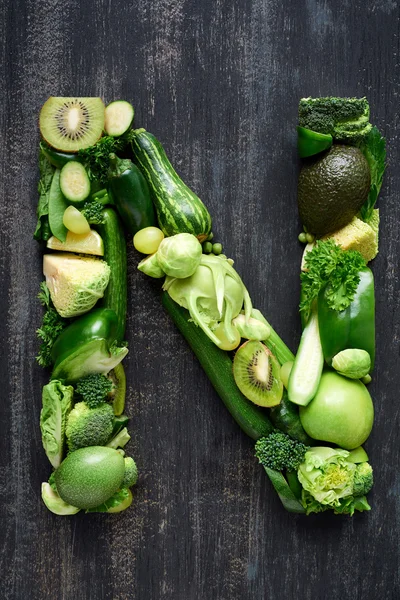 Letter made of green raw food