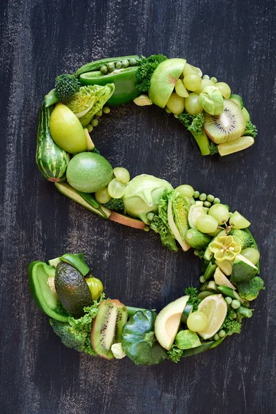 Letter made of green raw food