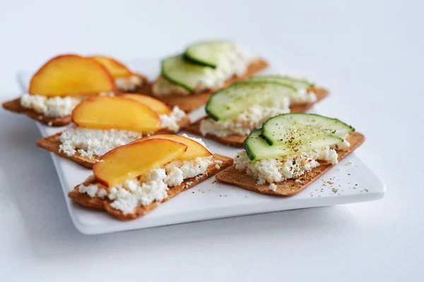 Ricotta cheese with peach and cucumber