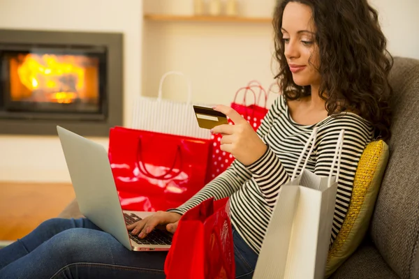 Woman online shopping  at home