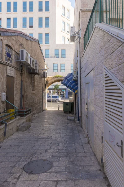 Narrow streets of old Jerusalem. Stone houses and arches