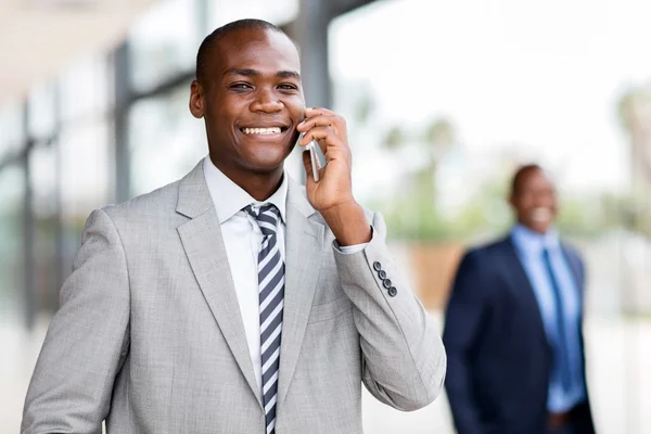 Corporate worker talking on mobile phone