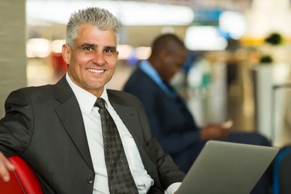 Man waiting at airport lounge