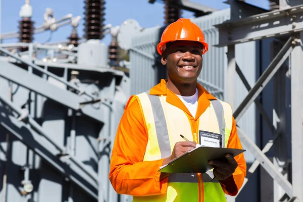 African technician working in substation