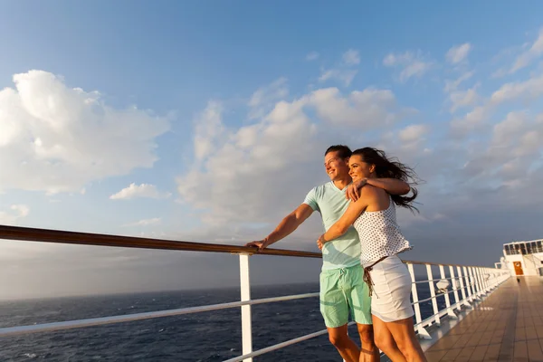 Couple standing on cruise deck