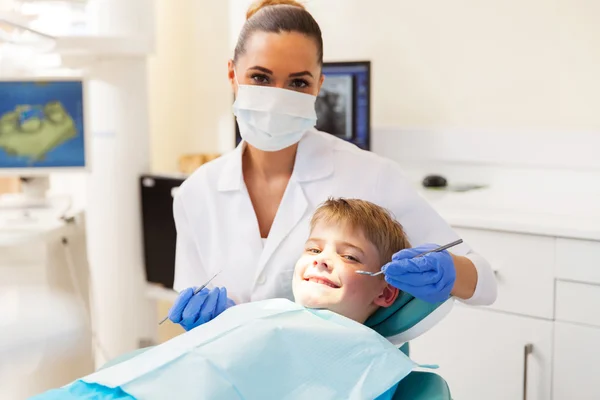 Boy getting dental checkup