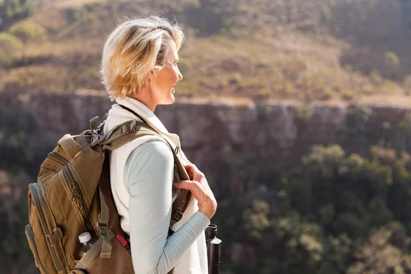 Woman standing on mountain