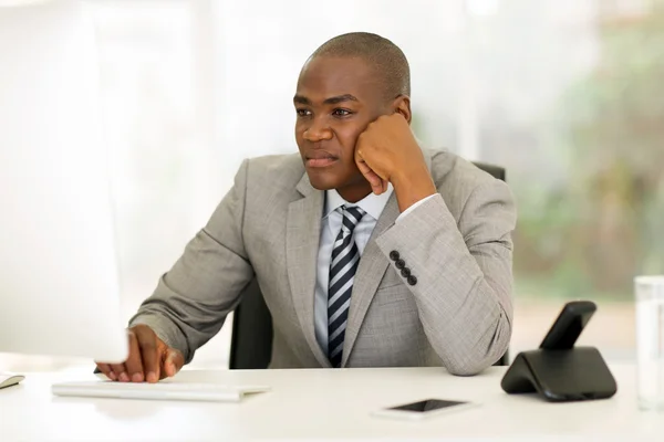 Businessman looking at computer screen