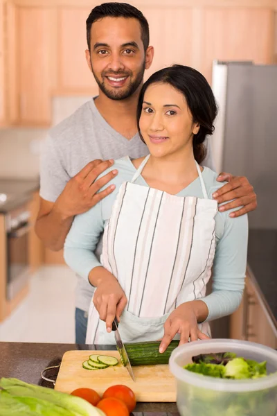 Indian couple cooking together
