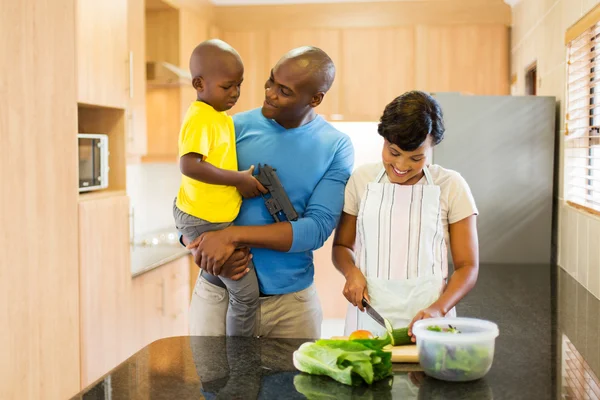 Family in home kitchen